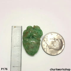 Carved jade pendant.