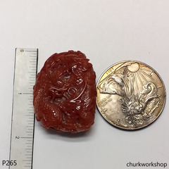 Red jade dragon pendant
