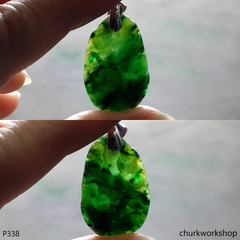 Dark green jade dragon pendant
