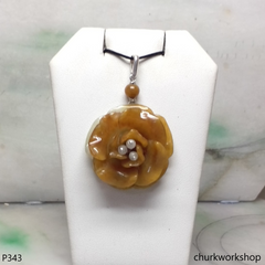 Red jade flower pendant
