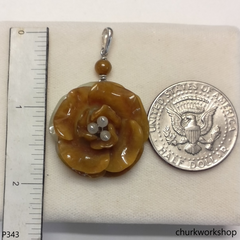 Red jade flower pendant