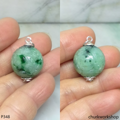 Light green carved jade bead pendant