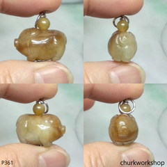 Red jade pig pendant with silver bail