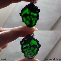 Deep green jade leaf pendant in 14k white gold