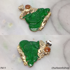 Deep green jade bird pendant in 14k gold