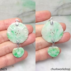 White with splotches green jade pendant
