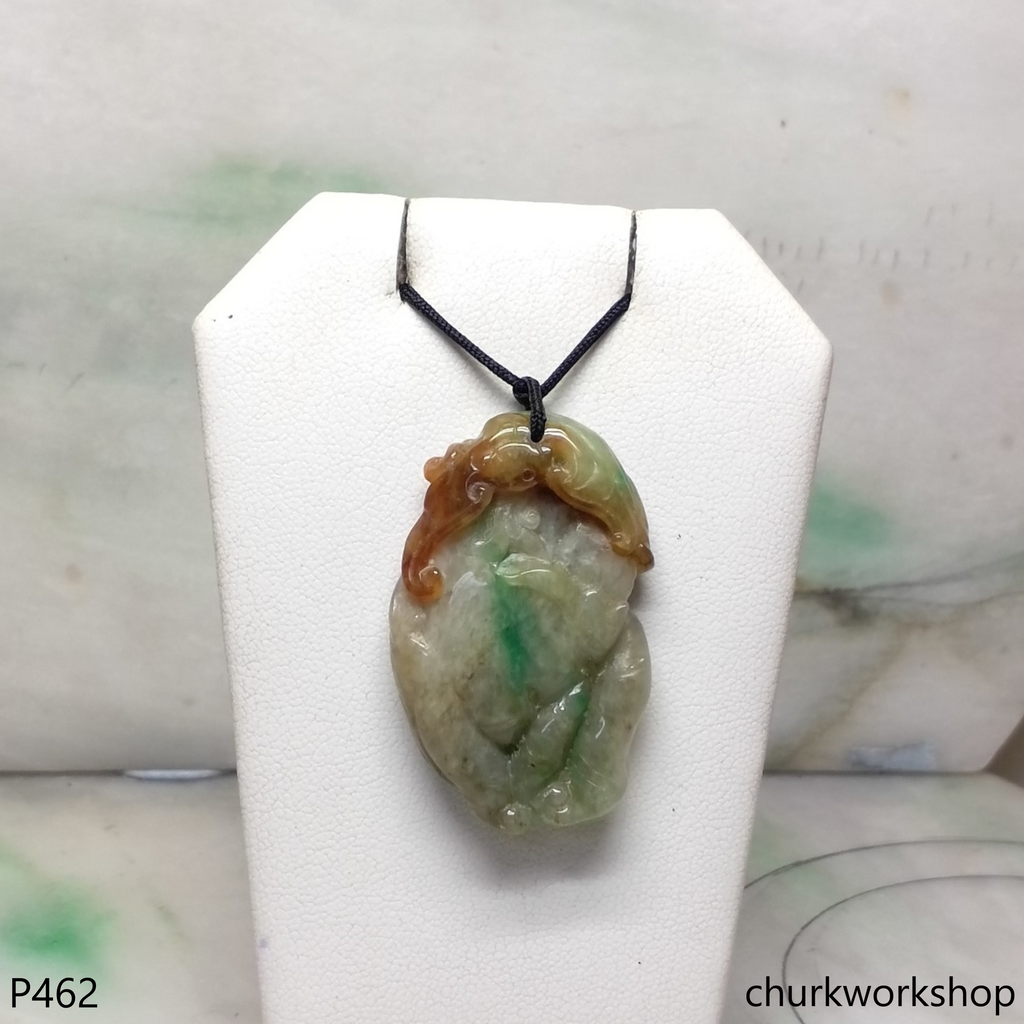 Carved jade pendant.