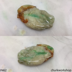 Carved jade pendant.