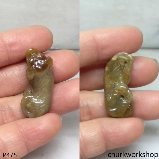 Red jade dog pendant with silver bail