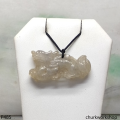 Pale brownish jade dragon pendant