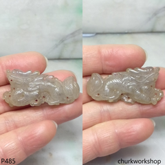 Pale brownish jade dragon pendant