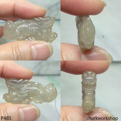 Pale brownish jade dragon pendant