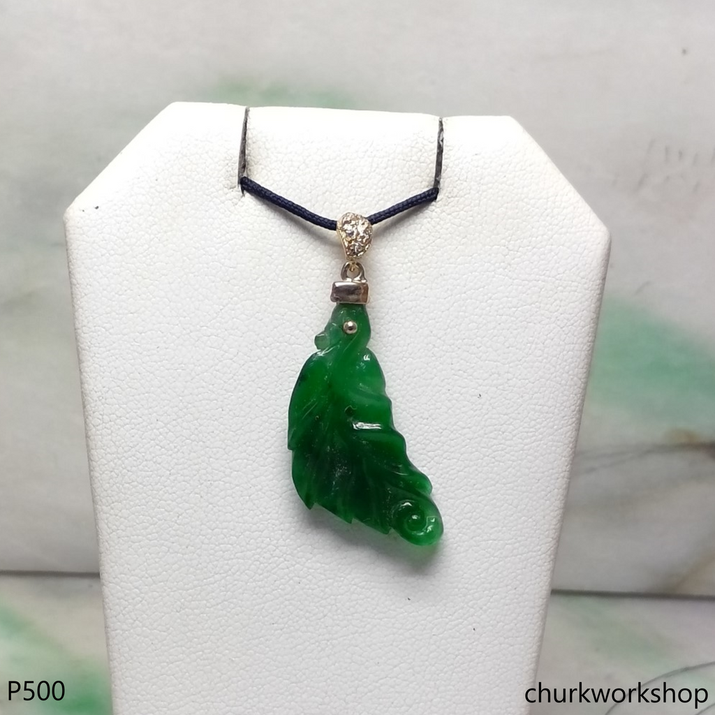 Green jade leaf pendant set in 14K yellow gold