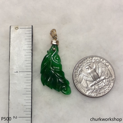 Green jade leaf pendant set in 14K yellow gold