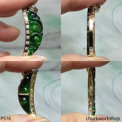 Deep green jade carved pendant in 14k yellow gold