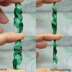 Green jade snake pendant.