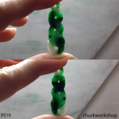 Green jade snake pendant.