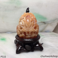 Light red jade nine dragons pendant