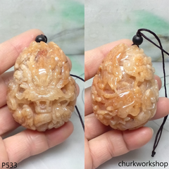 Light red jade nine dragons pendant