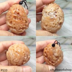 Light red jade nine dragons pendant