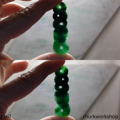 Green jade snake pendant.