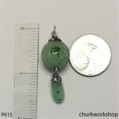 Light green carved jade bead pendant