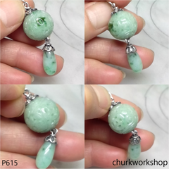 Light green carved jade bead pendant