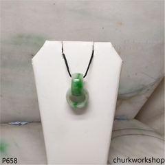 Interlocking jade ring pendant