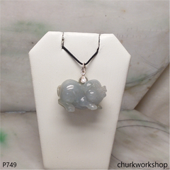 Grayish lavender jade pig with silver bail.