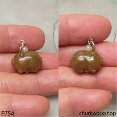 Red jade pig pendant with silver bail