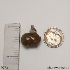 Red jade pig pendant with silver bail