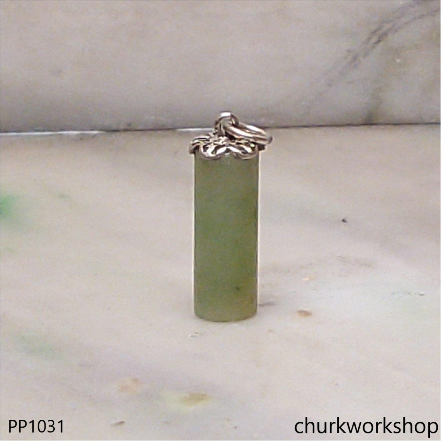 Yellowish green small jade cylinder