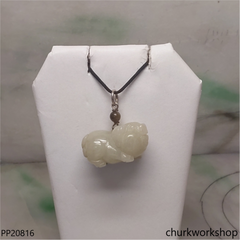 Yellowish jade pig pendant