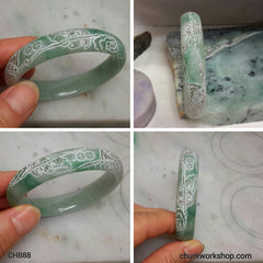 Craved light green jade bangle