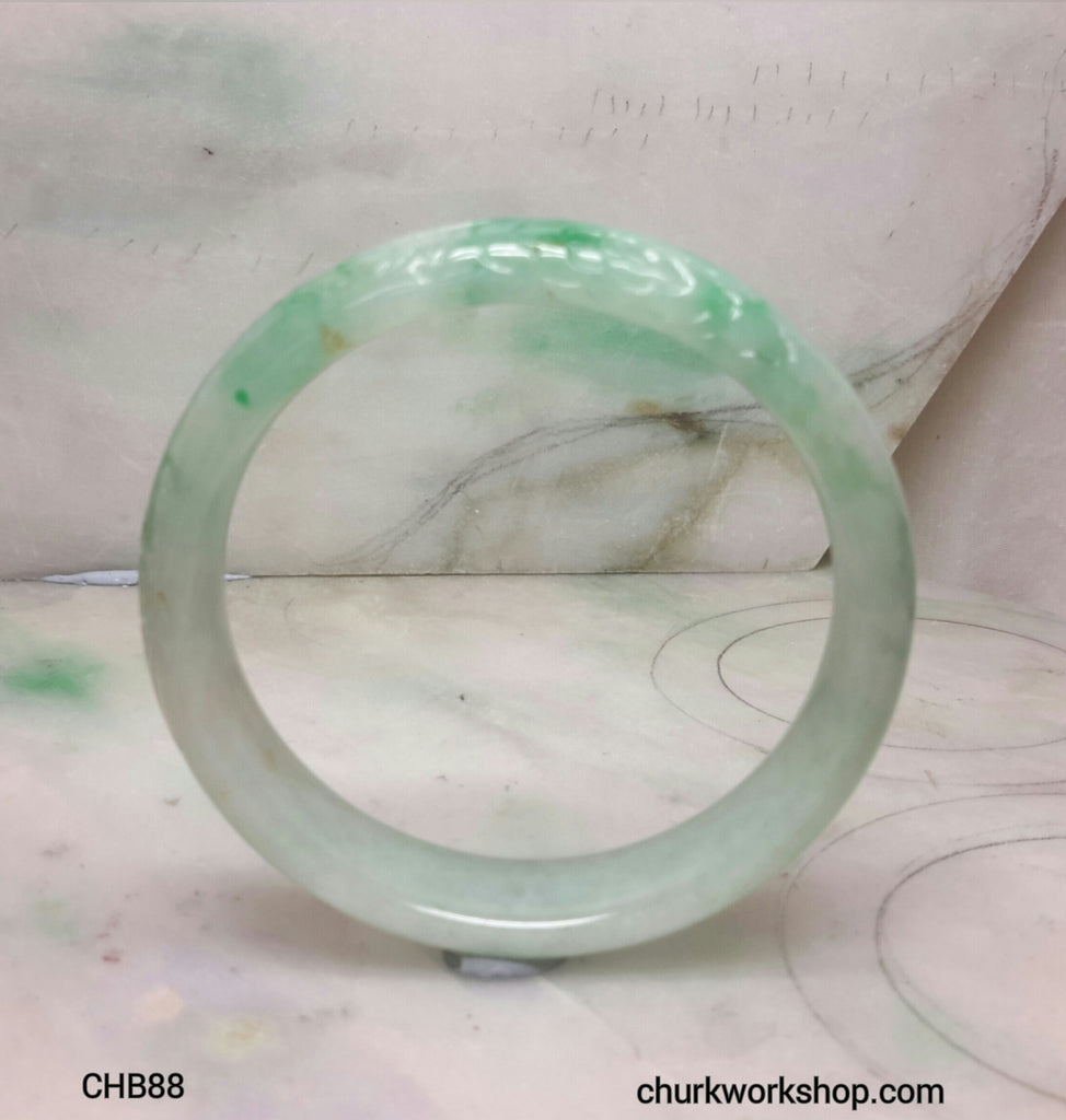 Craved light green jade bangle