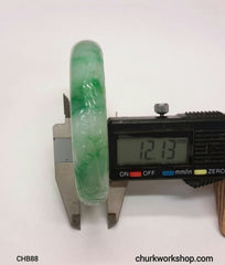 Craved light green jade bangle