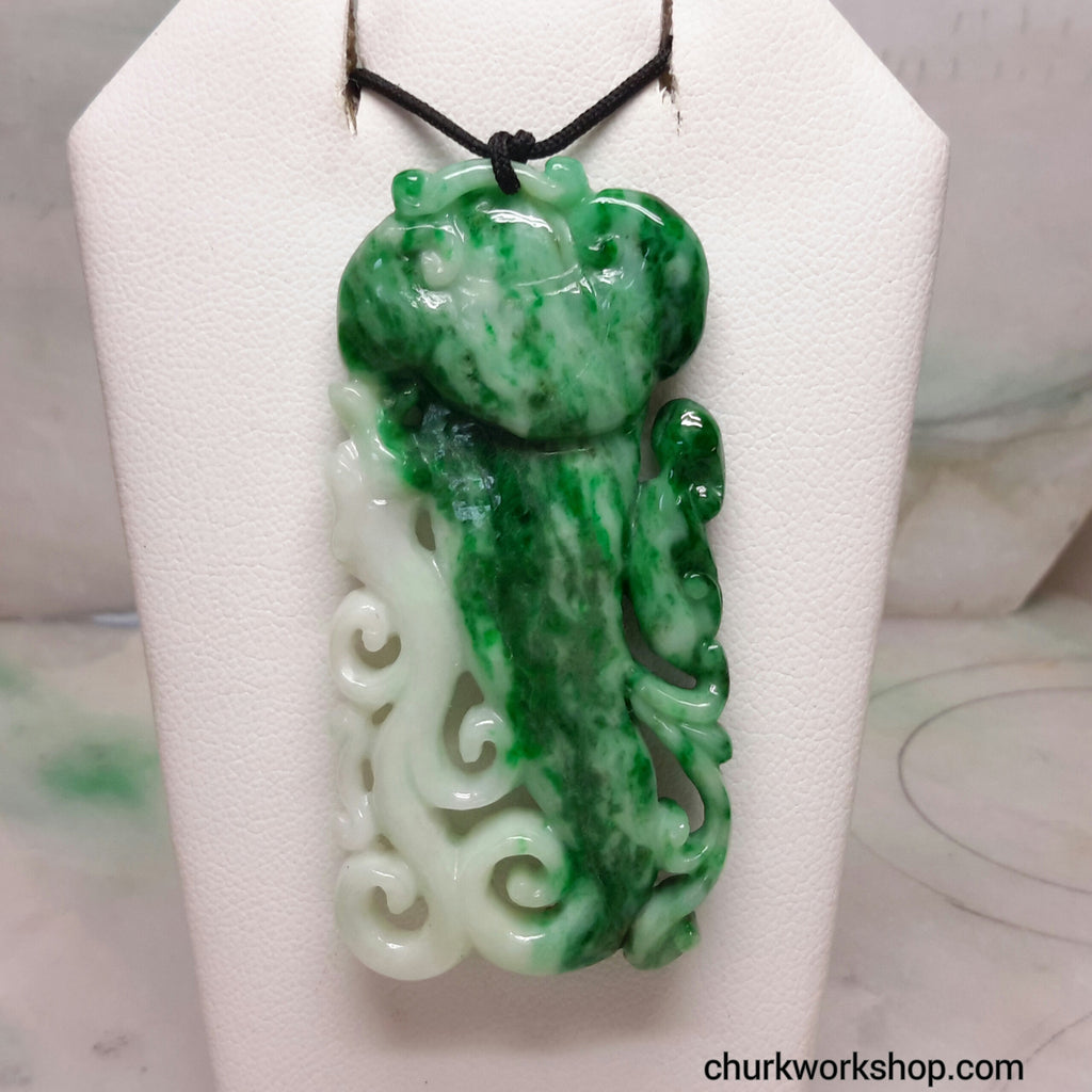 Carved jade pendant.