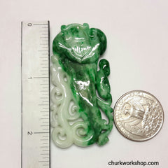 Carved jade pendant.