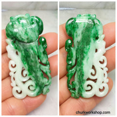 Carved jade pendant.