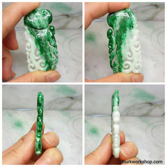 Carved jade pendant.