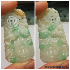 Carved jade pendant.