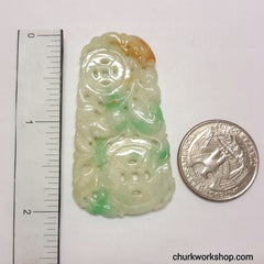 Carved jade pendant.