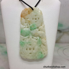 Carved jade pendant.