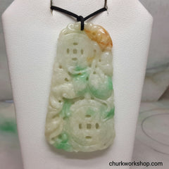 Carved jade pendant.