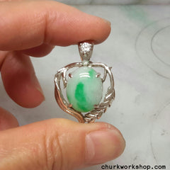 Green jade cabochon silver pendant