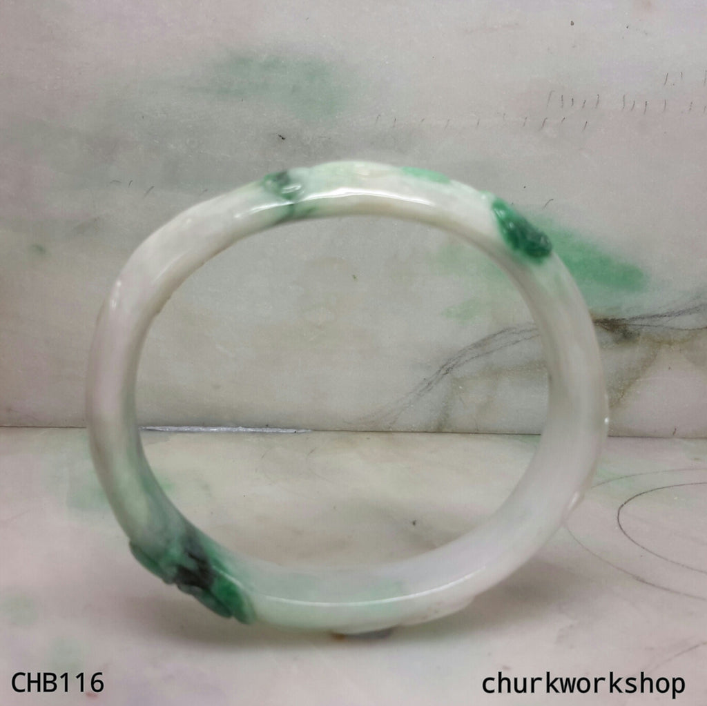 Carved green jade bangle