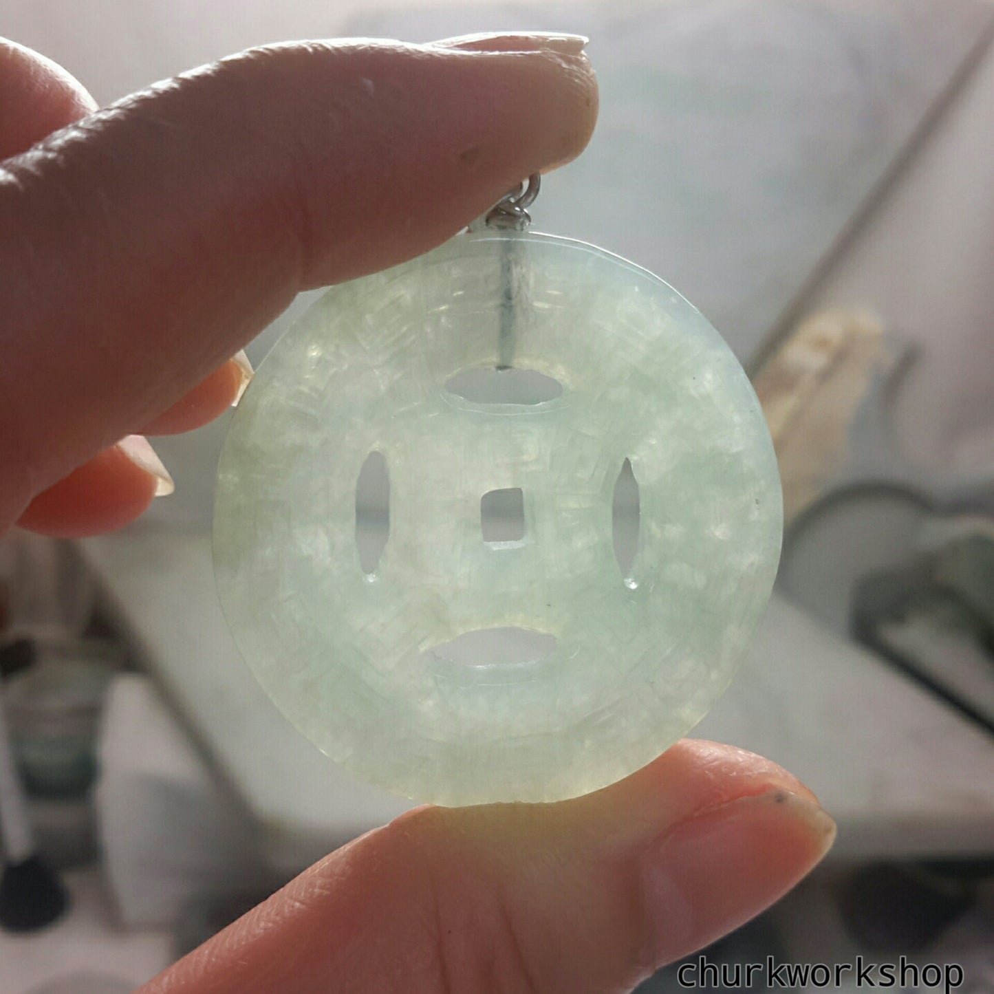 Jade coin pendant