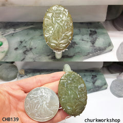 Jade flowers set with sterling silver bracelet