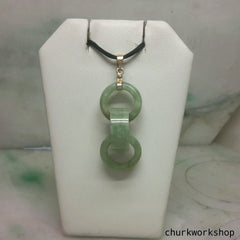 Triple ring pale green jade pendant