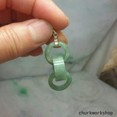 Triple ring pale green jade pendant